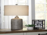 1 CERAMIC TABLE LAMP WITH AN ANTIQUE BLACK EFFECT AND FABRIC DRUM SHADE